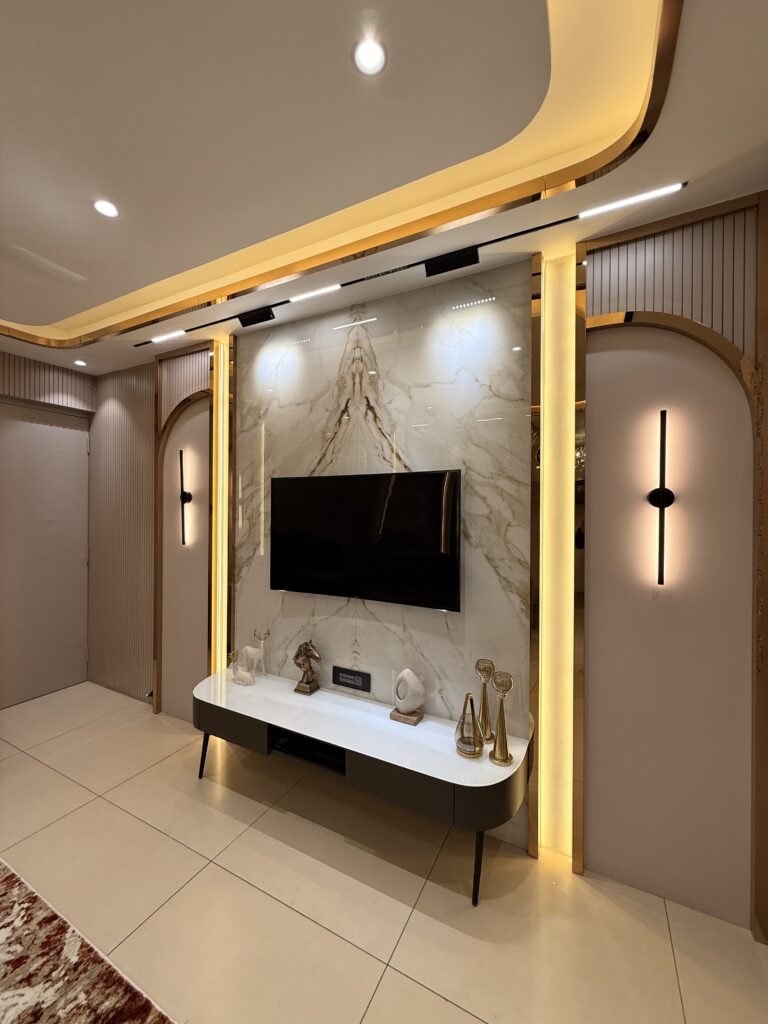 Portfolio Treeland living room TV wall with marble panel and arched lighting